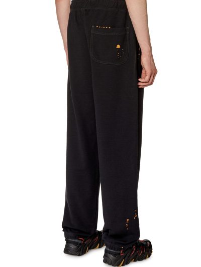 מכנסי טרנינג עם קרעים - שחור כתום